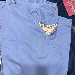 Vibrant Blue Scrub Top with Floral Accent